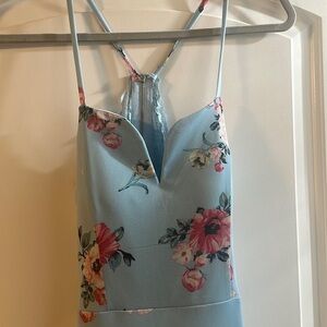 A Beautiful light blue summer dress with flower details